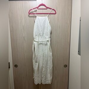 White jumper with open back